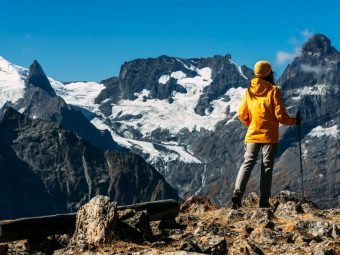 a-woman-traveling-in-the-caucasus-mountain-sports-athlete-happy-finish-mountain-tourism.jpg